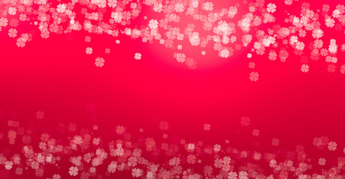 Beautiful bokeh Background with red colour on four leaf clovers pattern.