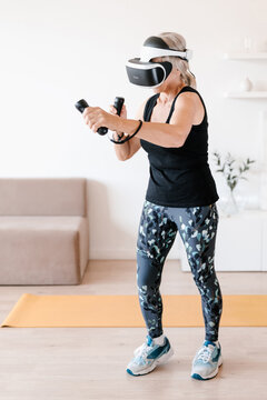 Elderly female athlete during VR workout