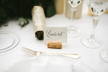 name tag for groom, placed in a cork from a bottle of wine