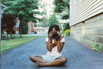 Black girl taking a picture
