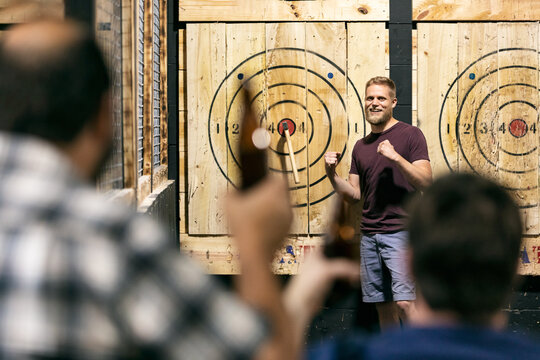 Man Excited After Hitting Bullseye