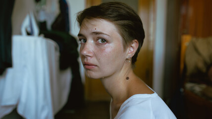 Sad crying woman looking at camera