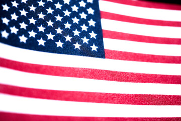 Macro Shot Of Handheld American Flag On Coarse Fabric
