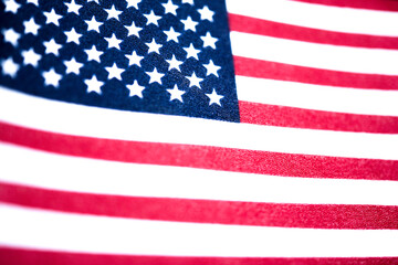 Macro Shot Of Handheld American Flag On Coarse Fabric