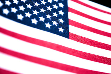 Macro Shot Of Handheld American Flag On Coarse Fabric