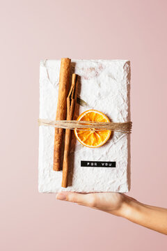 Recycled present against pink background