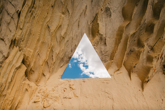 mirror on the ground with a reflection of the sky.