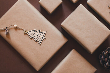 Wrapped christmas gifts on brown background