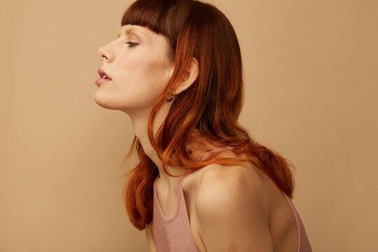 redhead woman studio portrait