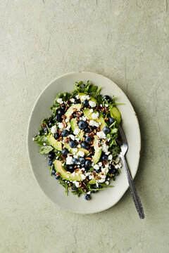 overehad shot of arugula salad