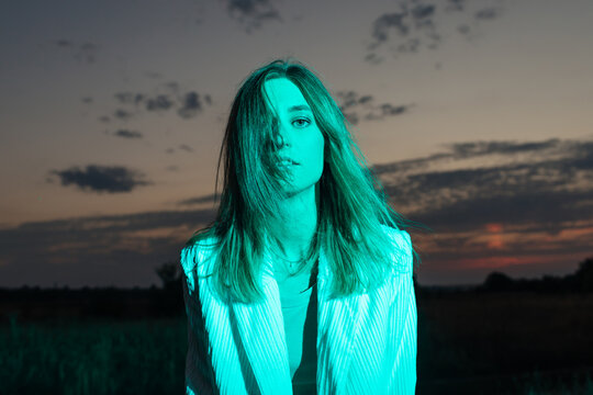 Colorful fashion portrait under neon light