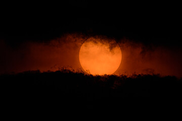 Obraz premium Dramatic sky orange of sun and clouds bright twilight backgrounds.
