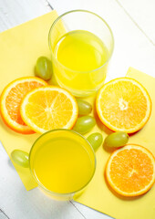 Two glasses of freshly made fruit juices