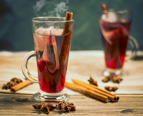 Two cups of herbal tea with cinnamon