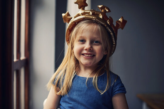 Child wearing a crown