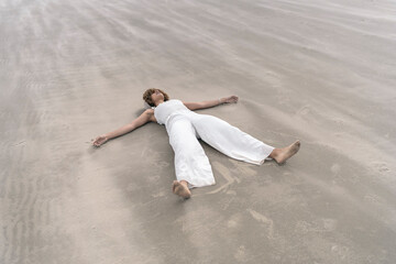 Black Woman Lying on the Beach