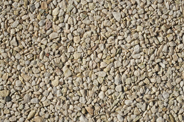 A wall of granite stones as a background.