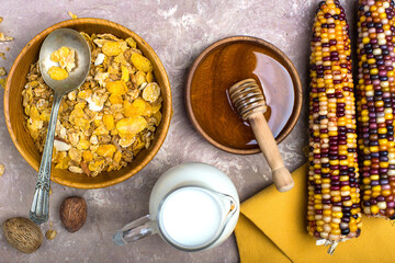 cornflakes with milk and honey top view