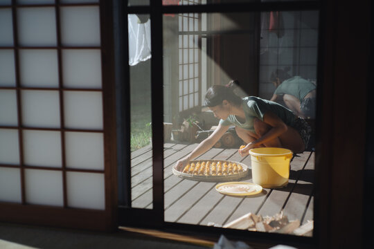 A Japanese Woman Making Salted Plums, Ume-boshi