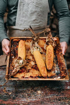 Baked corn on a tray.