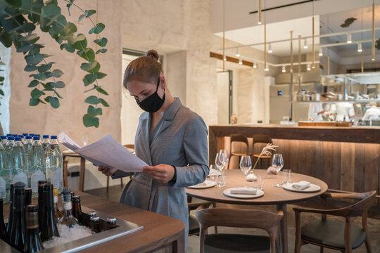 Waitress In Restaurant At Luxury Restaurant