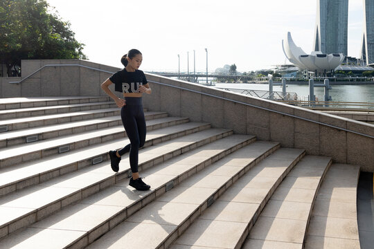 Asian woman exercising outdoors