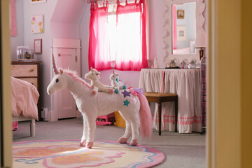 Unicorn Stuffed animal in Girls bedroom