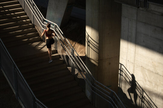 Woman running on the stairs