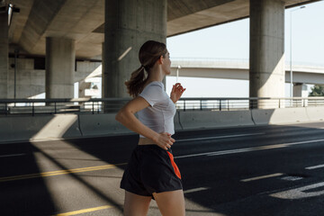 Side shot of woman running