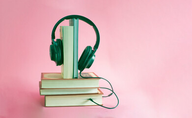 book and headphones. concept of audiobooks and education book, earphone, information, learning, library, listen, literature, reading, school, studying, textbook, education, music, sound, audio, techno