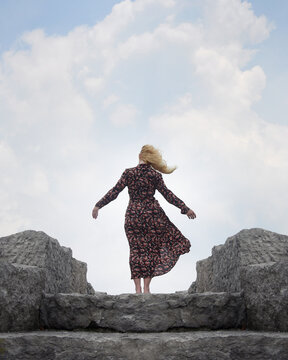 Woman Standing Alone with Wind