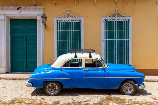 August 26, 2109: Vintage classic american car in a cuban street. Trinidad, Cuba