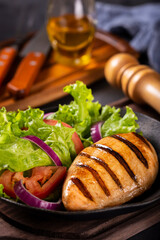 Tasty grilled chicken with salad.