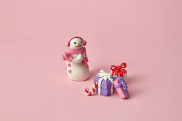 Christmas set with plasticine Snowman and many gifts.