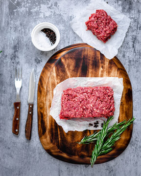 Raw Minced Beef on Wooden Board