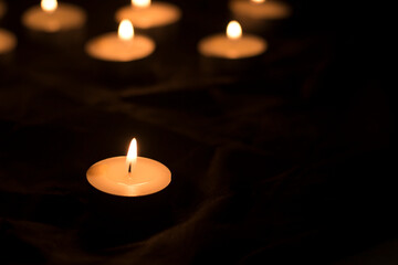 candles that are lit in the dark