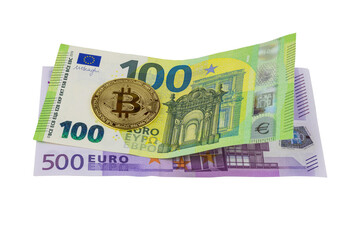 Bitcoin metal coin on two euro banknotes, concept