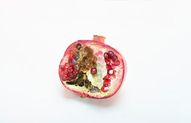 Rotten rotten pomegranate fruits. Top view. on white background