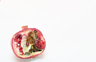 Rotten rotten pomegranate fruits. Top view. on white background