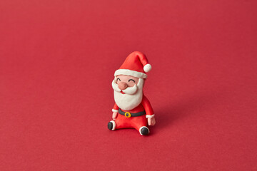 Handmade figure of Santa Claus from colorful plasticine.