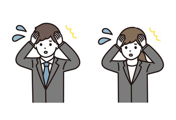 パニックになるスーツ姿の若い男性と女性