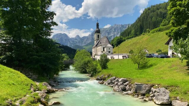 Scenic mountain landscape in the Bavarian Alps with famous Parish Church of St. Sebastian in the village of Ramsau, Nationalpark Berchtesgadener Land, Upper Bavaria, Germany
