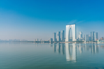 The modern skyline and Jinji lake in Suzhou, Jiangsu province, China.