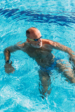 Active Senior Man Swimming