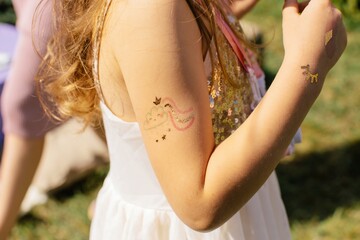 Girl with face tattoo