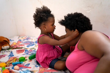 Affectionate Moment With Daughter And Mom At Home.