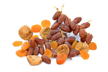 Dried dates, figs and apicots isolated on white
