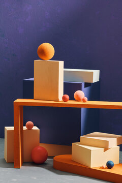 Abstract composition with basic shapes, standing on top of each other, maintaining balance