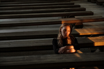 A girl in an abandoned Church