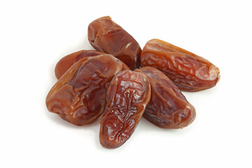 Heap of dried dates isolated on white